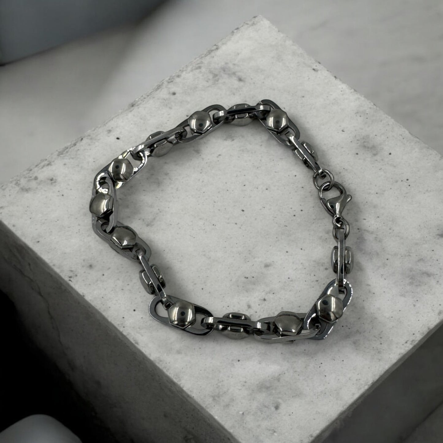Title: "Gunmetal Marine Chain Bracelet with Pebble Links"